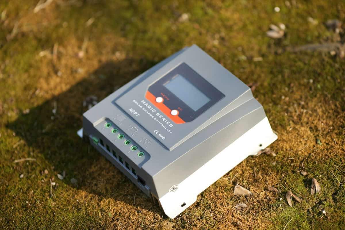 a microwave is sitting in the grass